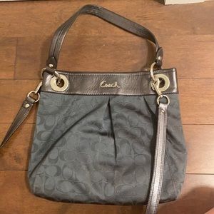 Coach slate gray handbag with detachable cross body strap.